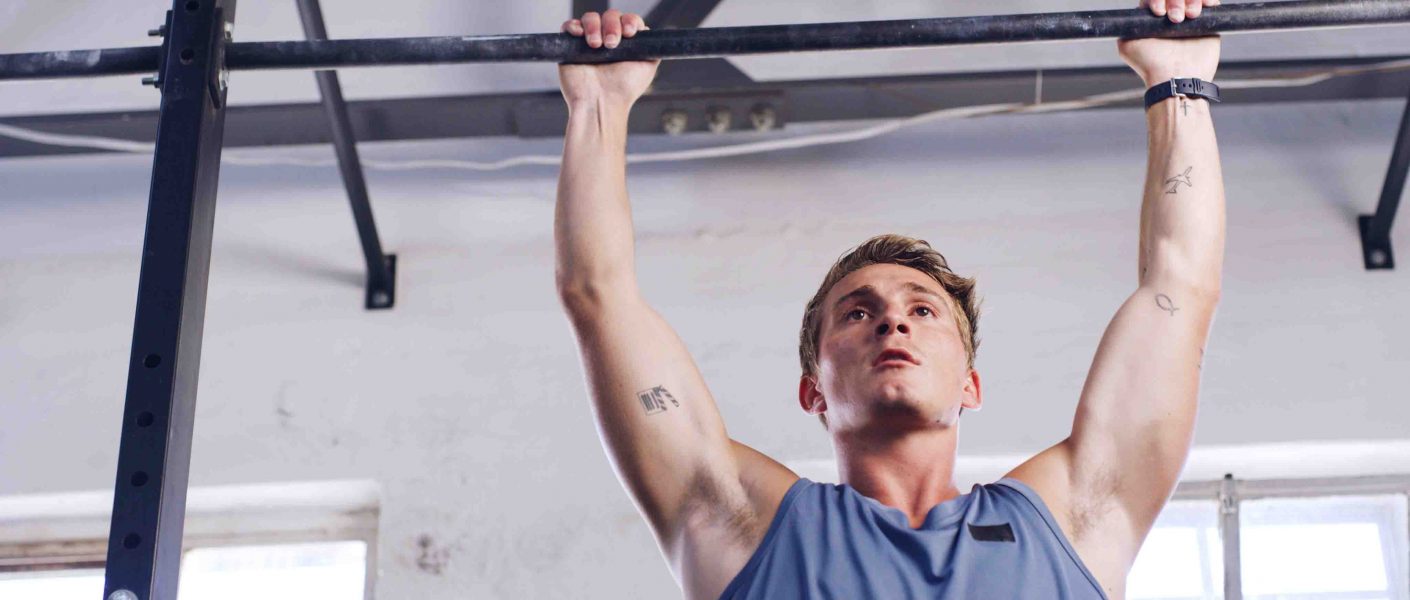 workout pull up bar fitness with man gym arm exercise health challenge strength training bodybuilder low angle with person sports club equipment athlete strong