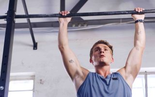 workout pull up bar fitness with man gym arm exercise health challenge strength training bodybuilder low angle with person sports club equipment athlete strong