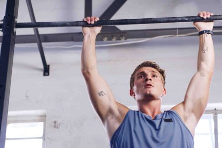 workout pull up bar fitness with man gym arm exercise health challenge strength training bodybuilder low angle with person sports club equipment athlete strong