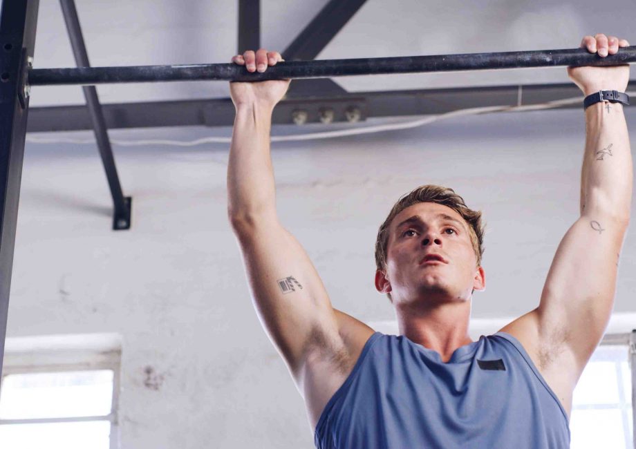 workout pull up bar fitness with man gym arm exercise health challenge strength training bodybuilder low angle with person sports club equipment athlete strong